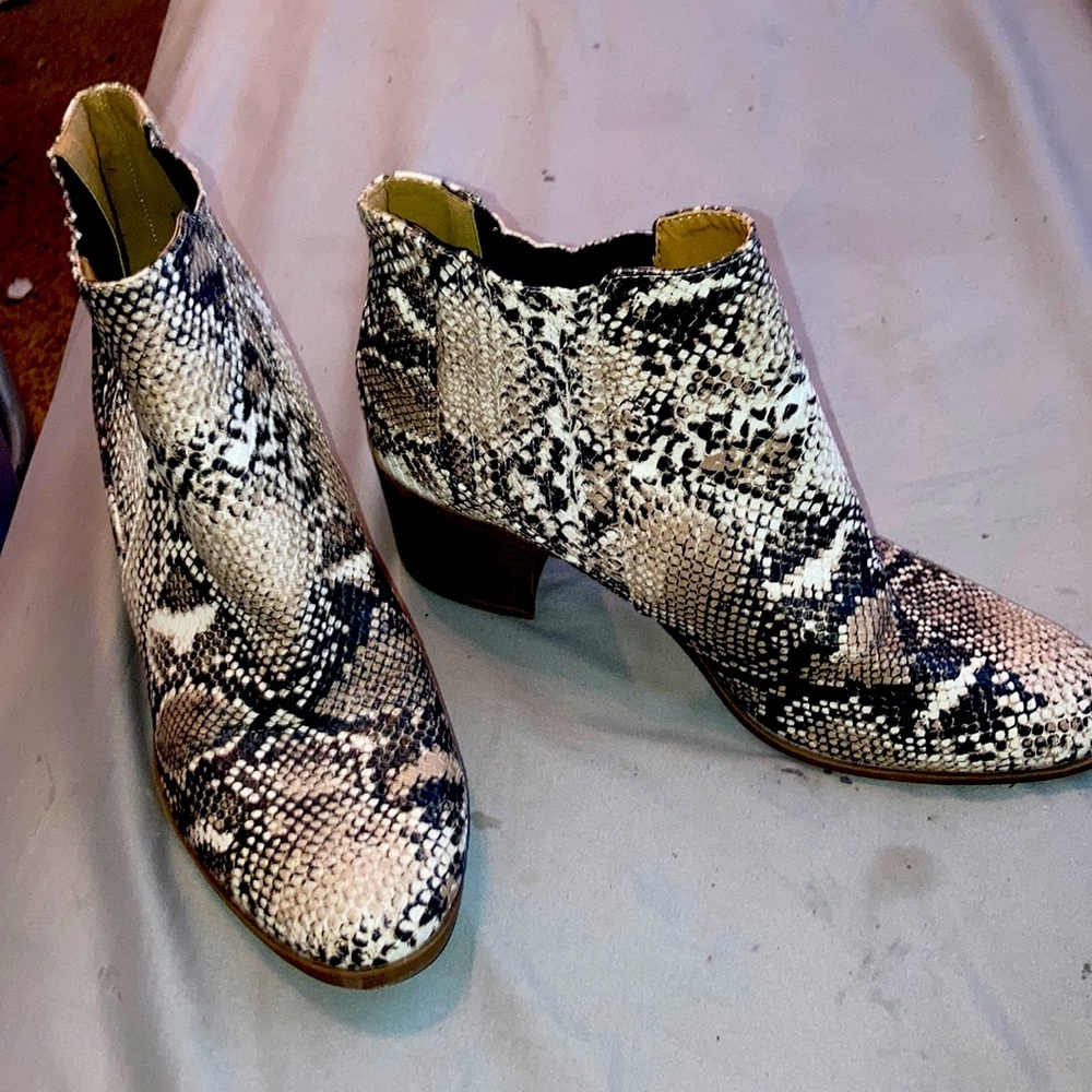 These are some ankle snake skin boots.